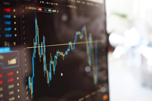 a side view of a screen that is displaying stocks information on it