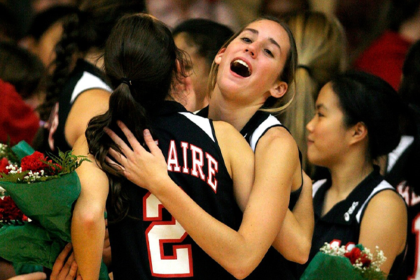 Volleyball team from Springfield High embrace after their win